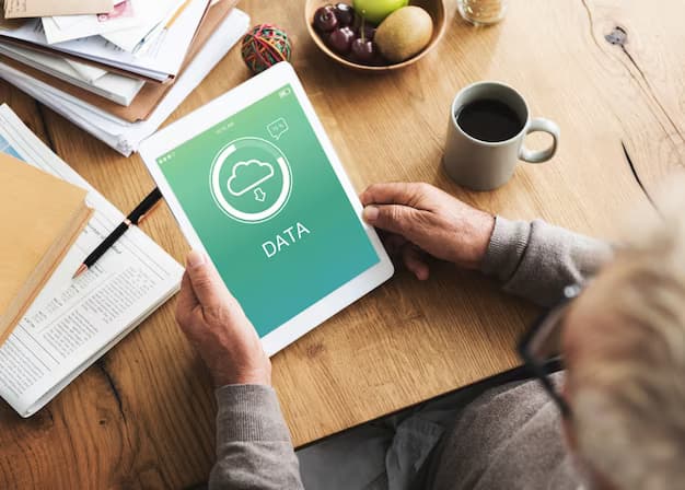 Man holding tablet with data inscription