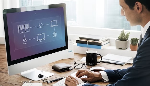 Man sitting at a computer in the office